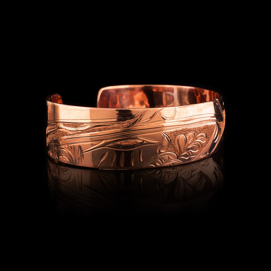 This Raven and Wolf copper bracelet cuff is hand carved with the legends.