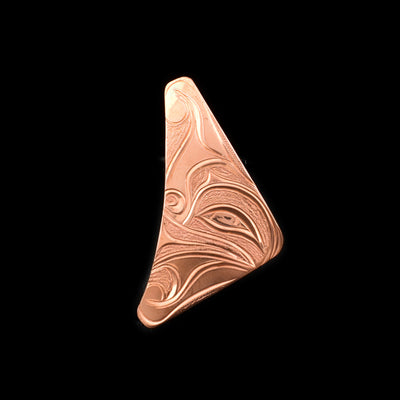 This crescent Moon brooch is made from copper and is triangular in shape. There are carvings on the surface of the pin that depict the Moon.