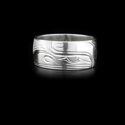 This sterling silver ring is a single band with the Raven carved into it.