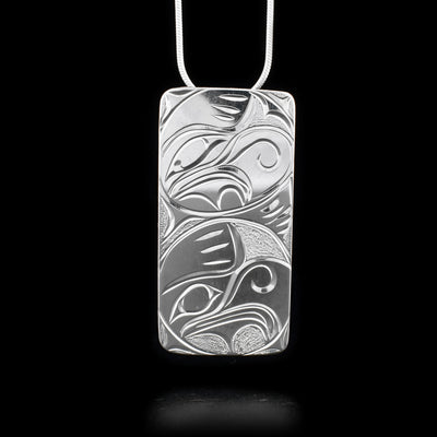 This Thunderbird pendant is made from sterling silver and has a rectangle shape. There is a gorgeous depiction of the Thunderbird carved into the surface of the pendant.