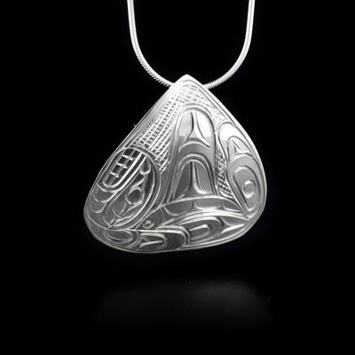 Sterling silver rounded triangle orca pendant.
