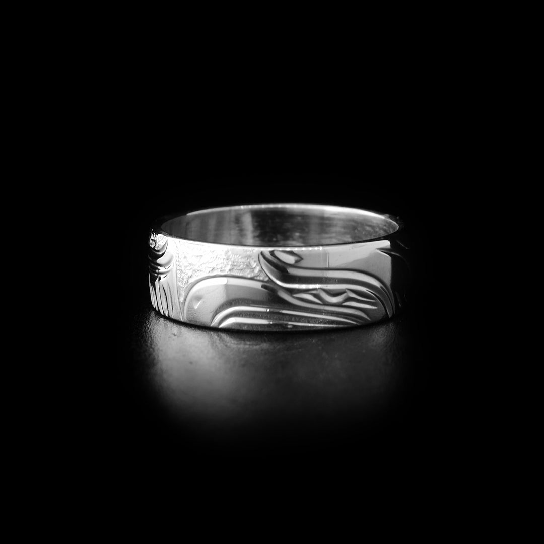 Sterling silver eagle ring with hand-carved eagle head and background designs. By Kwakwaka’wakw artist Cristiano Bruno.