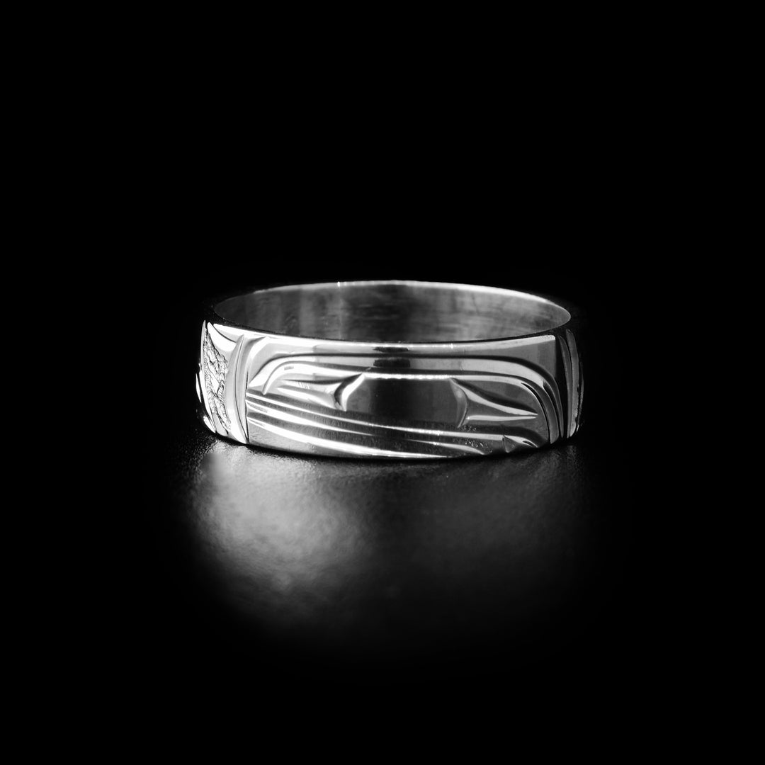 Sterling silver orca ring with hand-carved orca head and background designs. By Kwakwaka’wakw artist Cristiano Bruno.