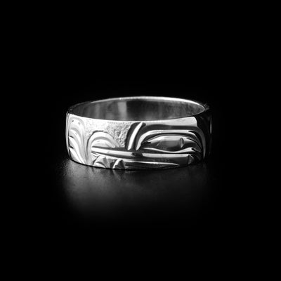 Sterling silver ring with hand-carved wolf head and background designs. By Kwakwaka’wakw artist Cristiano Bruno.