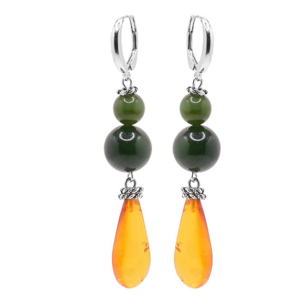 These Dangle BC Jade Amber Earrings Elegant Green Jade and Baltic Amber dangle earrings. Browse our exclusive collection of artisan jewelry and enjoy free shipping on all orders.