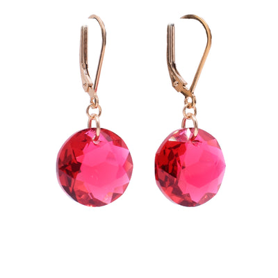 These crystal earrings have sterling silver, 14K gold fill hooks and chains. The hangs are made of circle shaped scarlet Swarovski crystals.