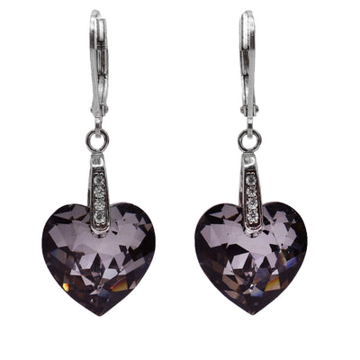 Sterling silver leverback earrings that have a heart shaped hang made out of dark gray Swarovski crystal. The bail that attaches the hang has tiny white crystals on it.