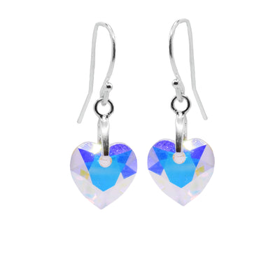 These Swarovski crystal heart earrings have, heart shape aurora borealis Swarovski crystals that are dangling from very small, sterling silver hoops. The hooks are long and the crystals reflect many different colors resembling the northern lights.