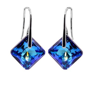 These diamond shaped earrings have Bermuda blue Swarovski crystal hangs that are diamond shaped. The crystals drop down and hang from sterling silver hooks.