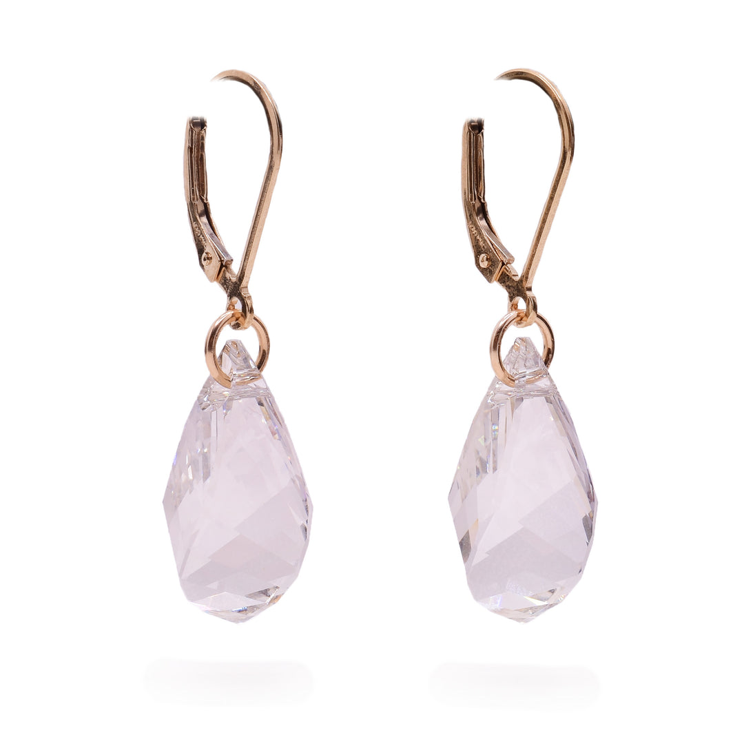 These crystal earrings have large hooks made from sterling silver and gold fill. Attached to the hooks are teardrop shaped, silvershade Swarovski crystals.