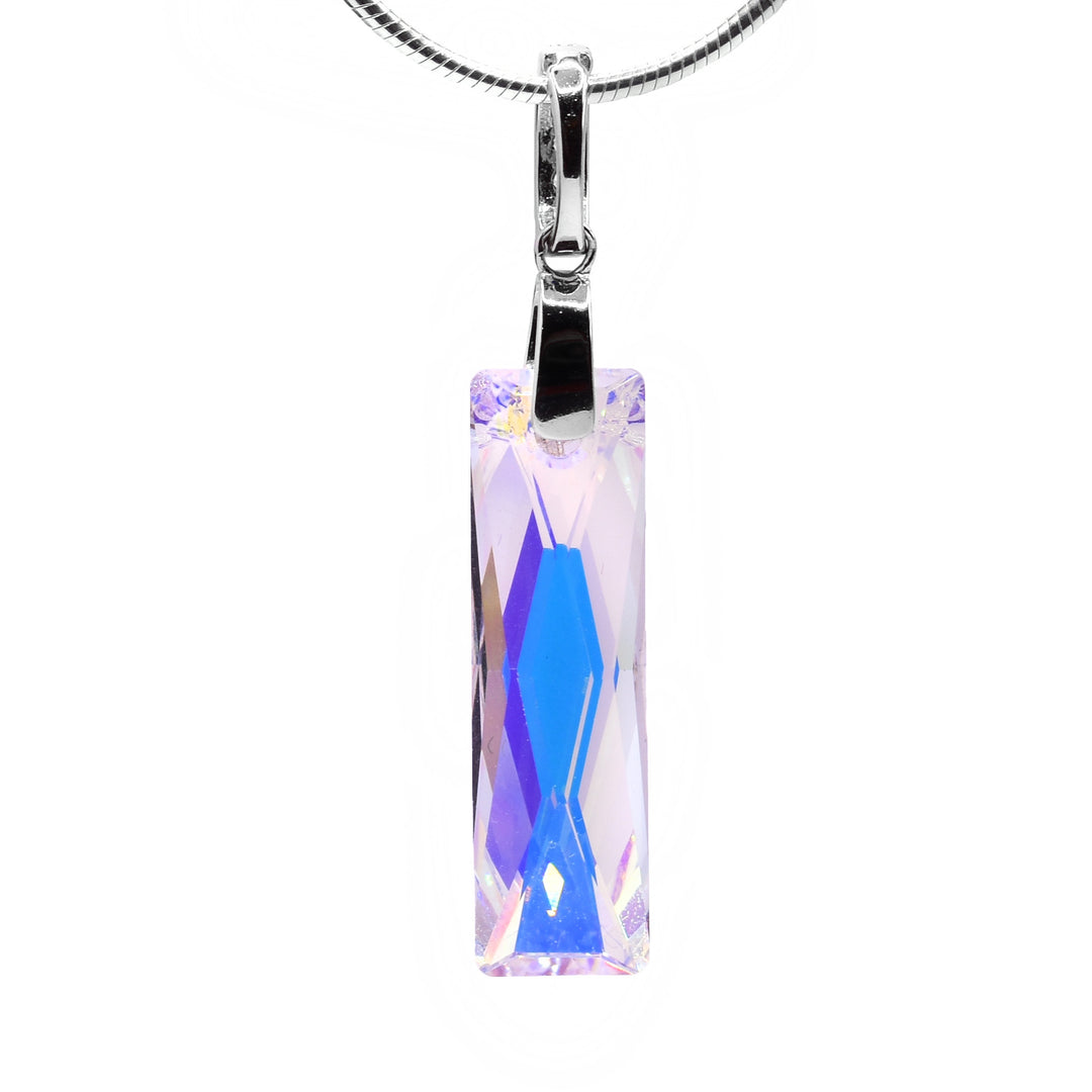 This long crystal pendant is made from aurora borealis Swarovski crystal that is long, thin and rectangle shaped. The crystal reflects many colors mimicking the northern lights and is dangling from  a long, sterling silver jump ring.