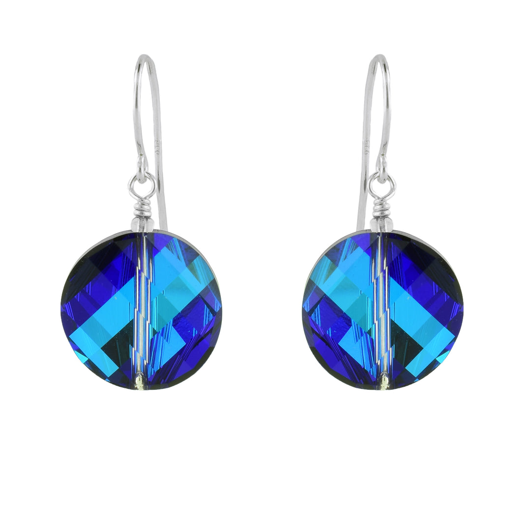 Deep blue Swarovski crystal drop earrings handcrafted by artist Debra Nelson in sterling silver.