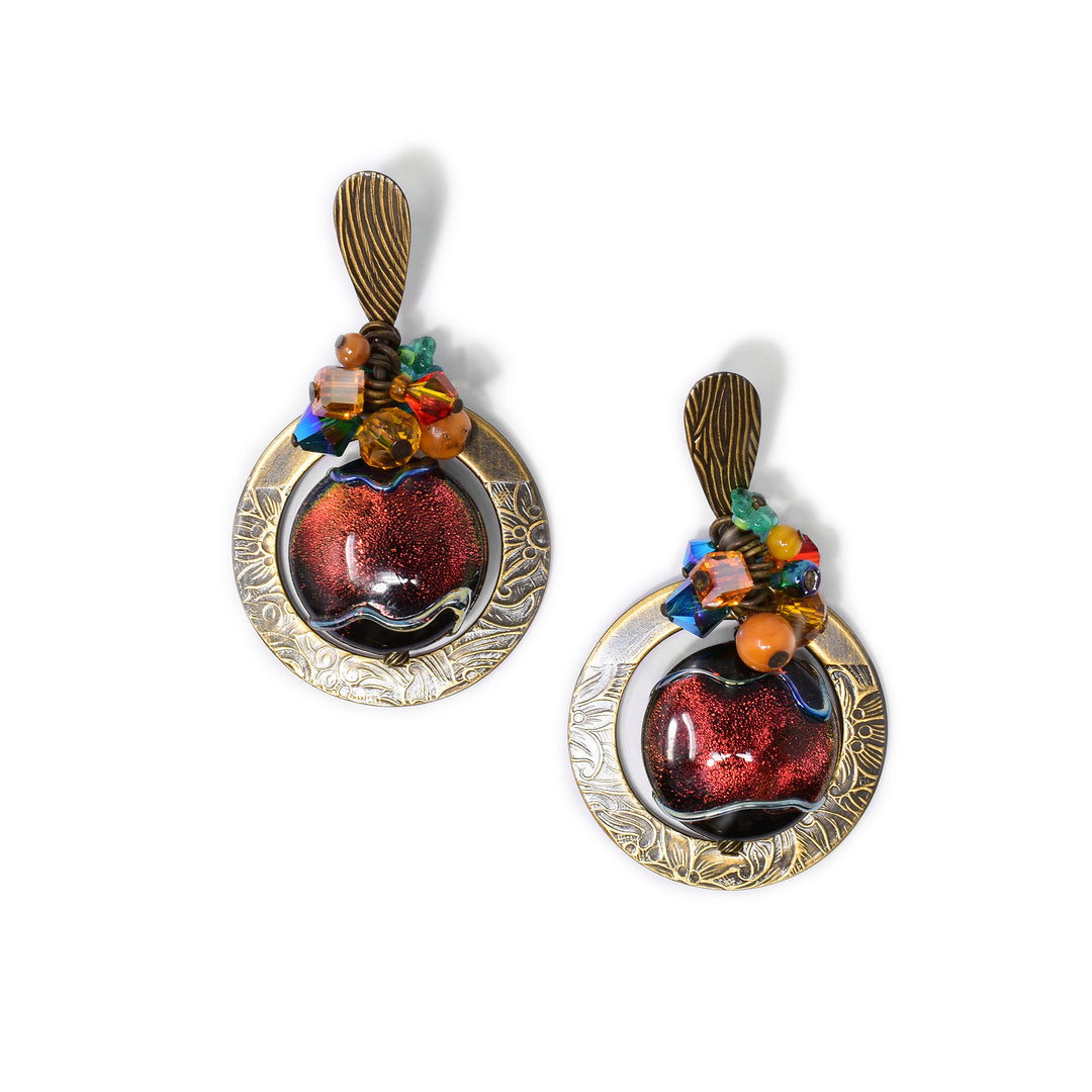 Deep red galaxy stud dangle earrings made of hand worked brass, mother of pearl, handmade art glass, Swarovski crystal, amber and glass. Titanium ear posts. By Honica.