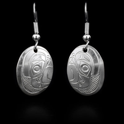 These sterling silver Eagle earrings have hooks which have oval hangs. The hangs have the face of the Eagle handcarved onto them.