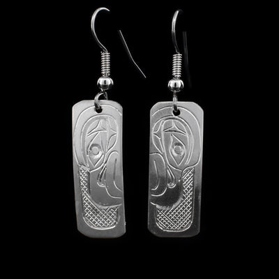 These sterling silver dangle earrings have rectangular hangs with Eagles carved into them