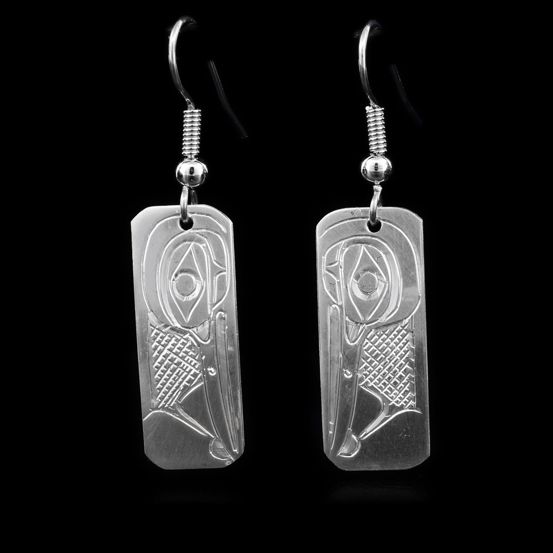 These sterling silver dangle earrings have rectangular hangs with the Hummingbird carved into them.