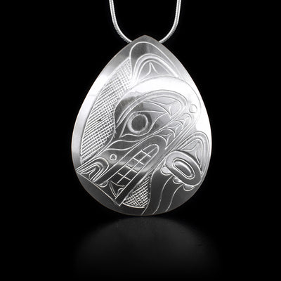 This sterling silver pendant is shaped like a wide teardrop. It has the Wolf etched into it.