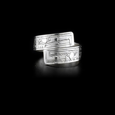 Sterling silver double wrap ring featuring two eagles. Hand-carved by Coast Salish artist Jeffrey Pat.