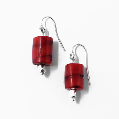 Sterling silver dyed red bamboo dangle earrings with sterling silver adornments on bottom.