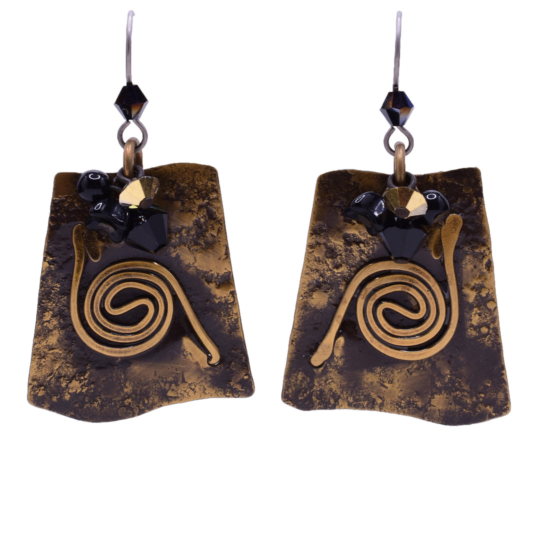 Dangle earrings made of Austrian crystal, glass and handworked brass. Titanium ear hooks. By Honica.