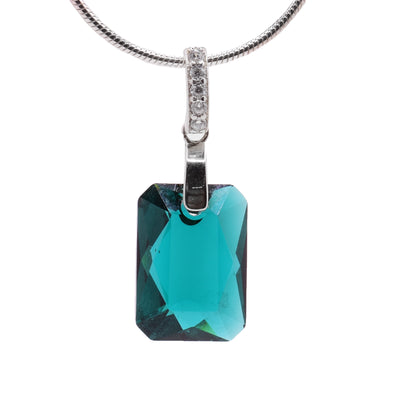 Sterling silver emerald cut green Swarovski crystal pendant by artist Debra Nelson.