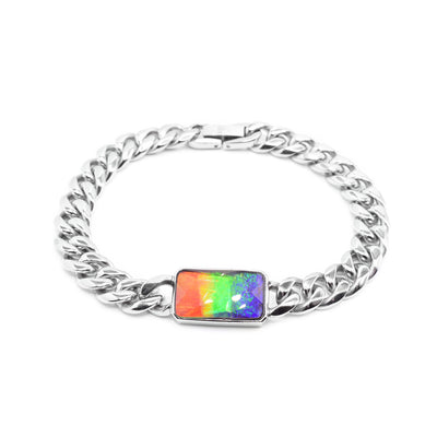 This sterling silver chain bracelet has a rectangular charm made of a beautifully cut ammolite gemstone.