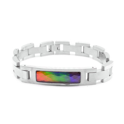 This chunky chain bracelet is made from sterling silver and ammolite gemstone. The gem is set in a silver, rectangle box with a thick chain running across the piece.