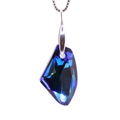This Swarovski crystal pendant features a blue gem shaped crystal with a long dainty bail. 