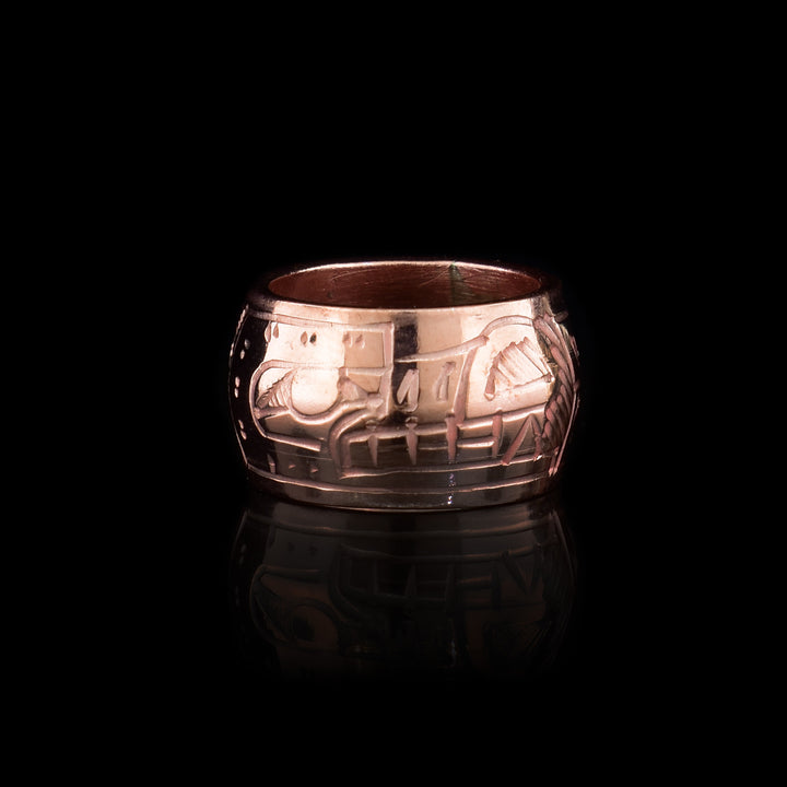 This Wolf spirt bead is a copper charm with a depiction of the Wolf carved across the surface of the bead.