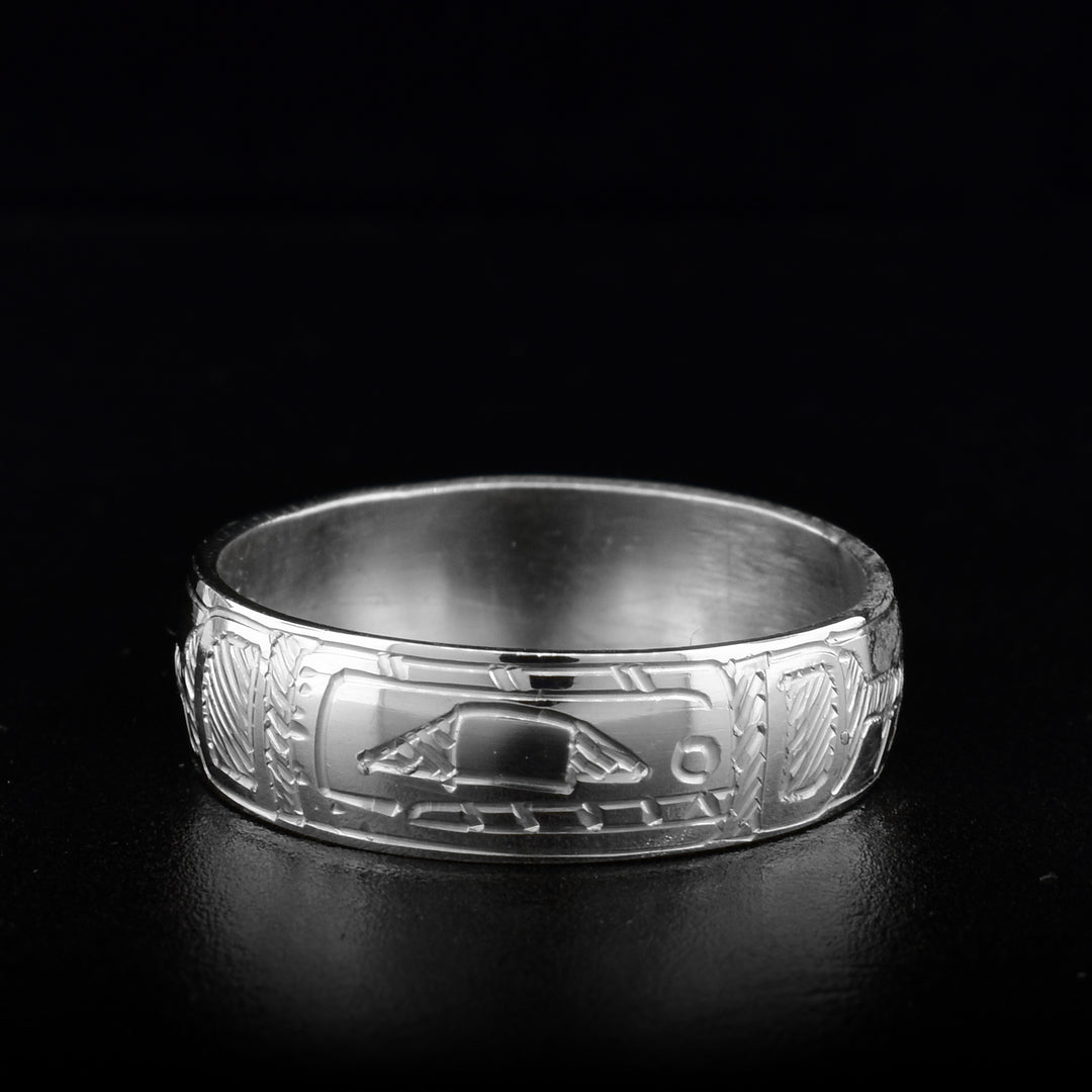The Orca ring is made out of sterling silver. The Orca's face is carved on one side of the band. The rest of the band has the Orca's body carved on it.