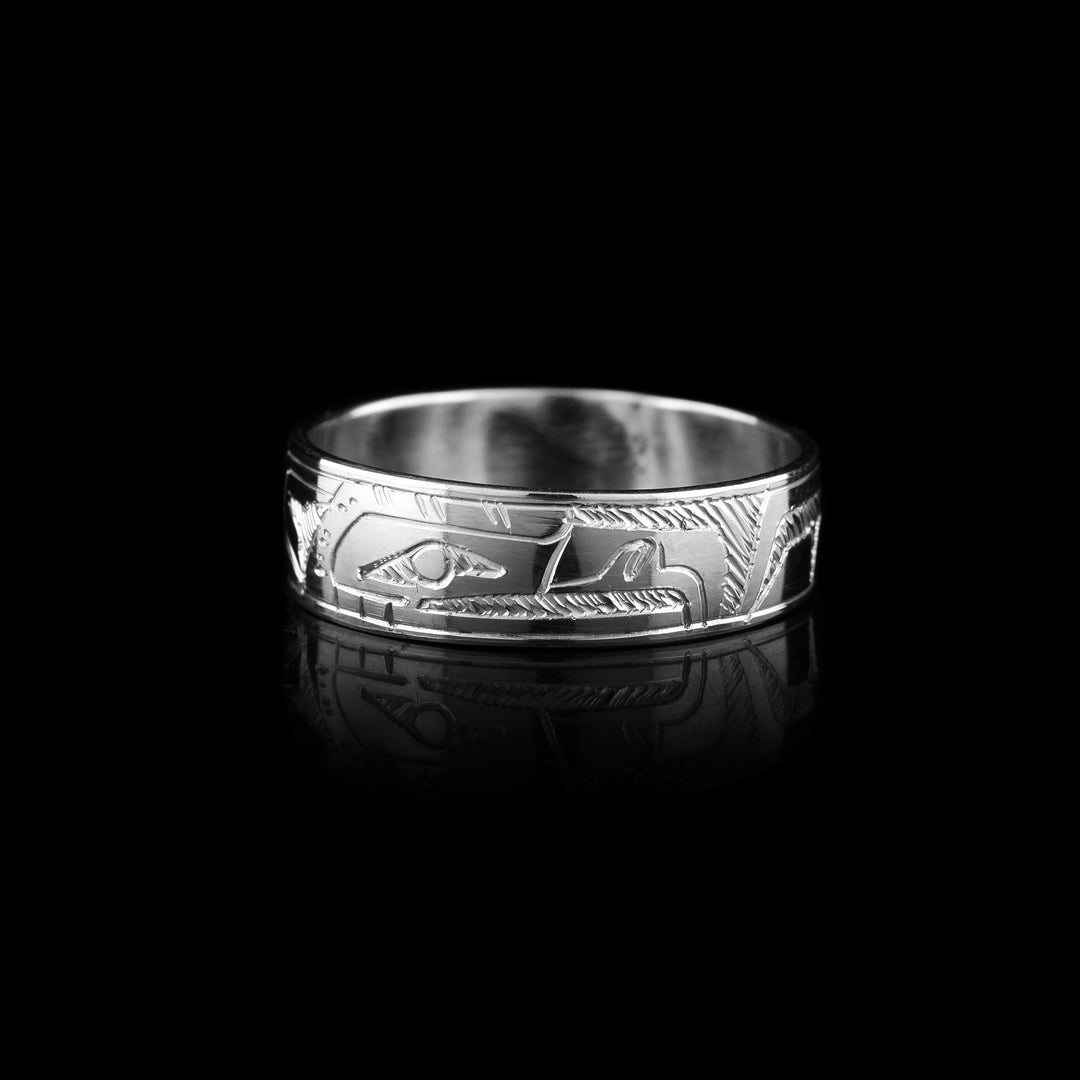 This silver band Eagle ring is made from sterling silver and has a depiction of the Eagle carved into it.