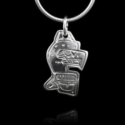 This Mini Eagle pendant is made from sterling silver. The pendant is shaped like and has carvings on the surface of it that depict the Eagle.