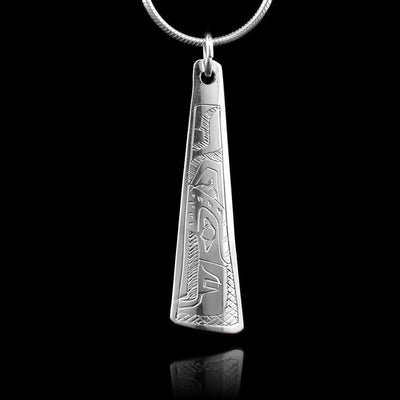 This sterling silver Eagle pendant is triangular and there is a depiction of the Eagle carved into the surface of the piece.