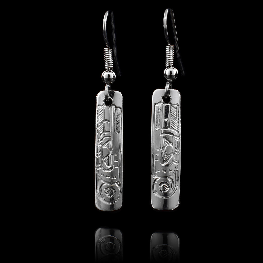 These sterling silver Hummingbird earrings have rectangular hangs and there are depictions of the Hummingbird  carved into them.