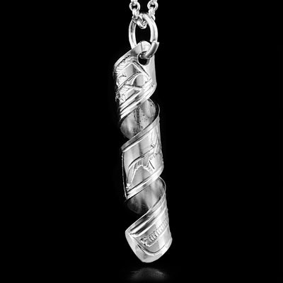This sterling silver spiral pendant is made our of a strip of sterling silver. The strip of sterling silver depicts the head and body of the Raven. The strip is coiled into a spiral.