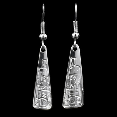 These triangular drop earrings are made from sterling silver and have long triangular hangs with rounded edges. There are beautiful carvings on the surface of the hangs depicting the Wolf.