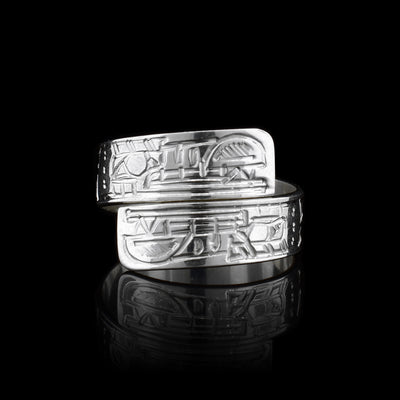 This sterling silver Wolf ring wraps around the finger twice and there is a depiction of the Wolf carved into the surface of the band.