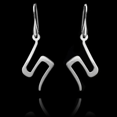These sterling silver dangling earrings have thin hangs that drop down and turns in a large zig-zag. The curves of the zig zags are squared. The hangs depict a Haida Gwaii character.