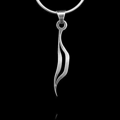These sterling silver pendants are thin and drop down with a split in the middle that forms a teardrop shape. The piece represents a Haida character.