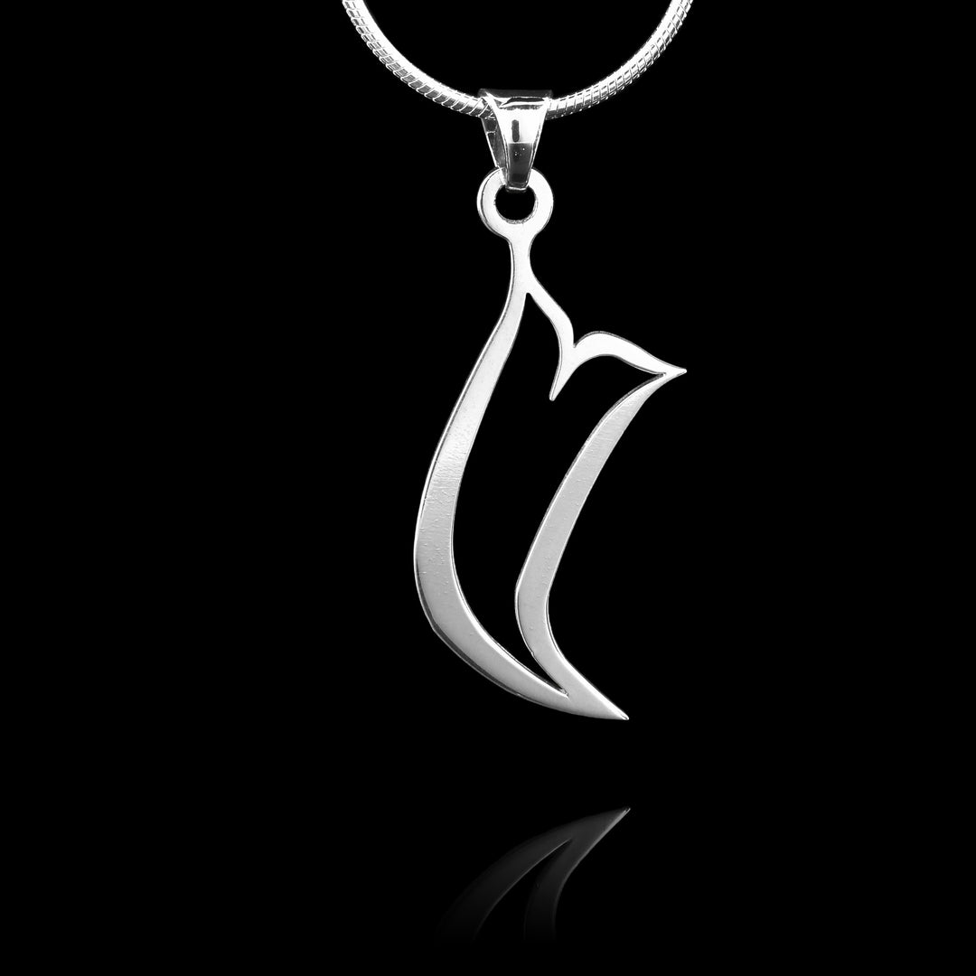 These sterling silver pendants have a long and unique whale tail shape to them The piece depicts a Haida Gwaii Character.