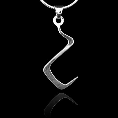 These sterling silver pendants are thin and curved in a zig-zag shape with the bottom curving into a hook shape. The piece represents a Haida Gwaii character.
