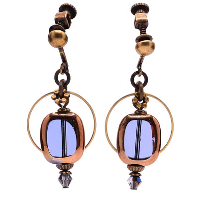 Dangle earrings made of Austrian crystal, dumortierite and glass. Brass ear clips. By Honica.