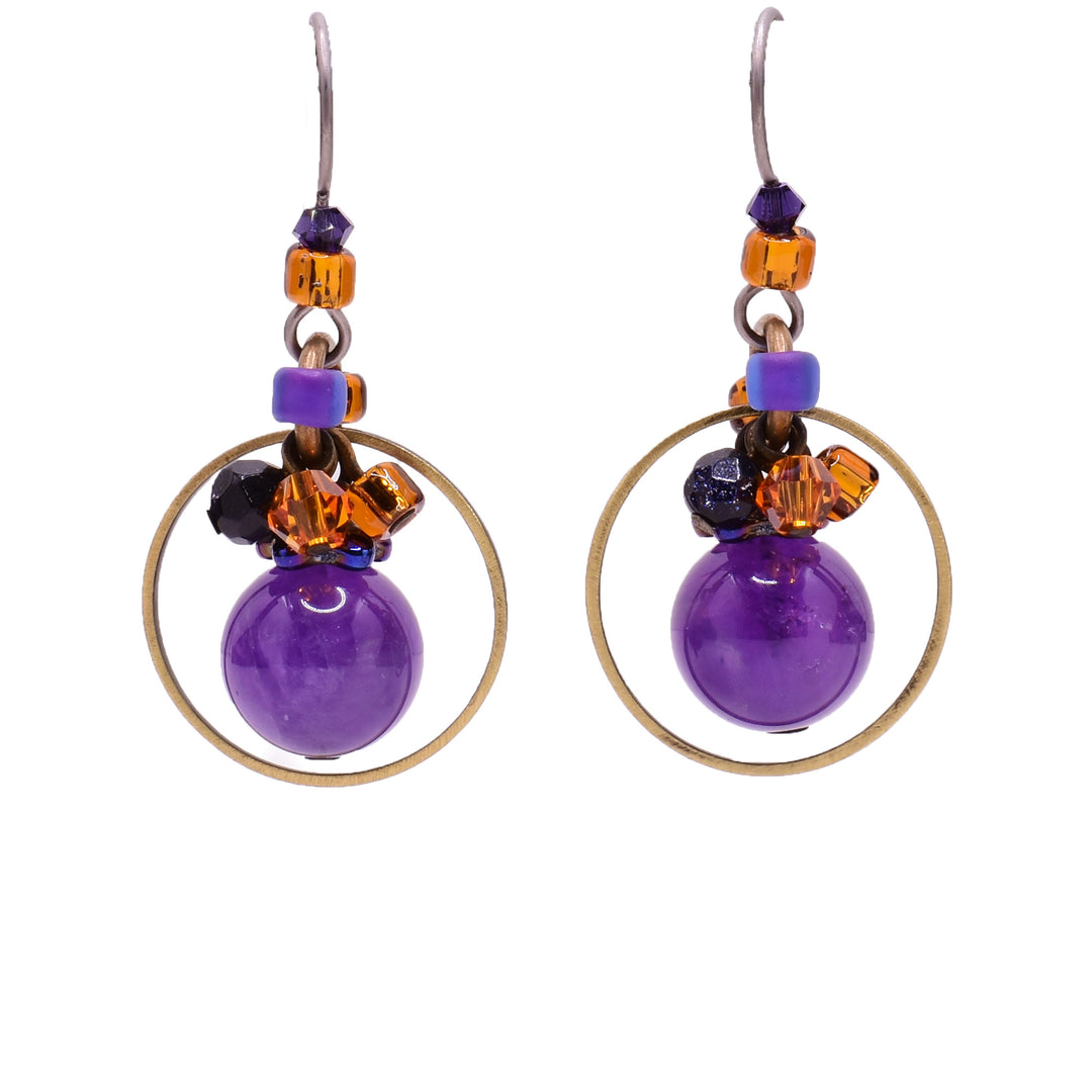 Dangle earrings made of purple goldstone, Austrian crystal, amethyst and glass. Titanium hooks. By Honica.