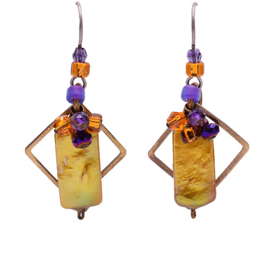 Dangle earrings made of freshwater pearls, amethyst, Austrian crystal and glass. Titanium hooks. By Honica.