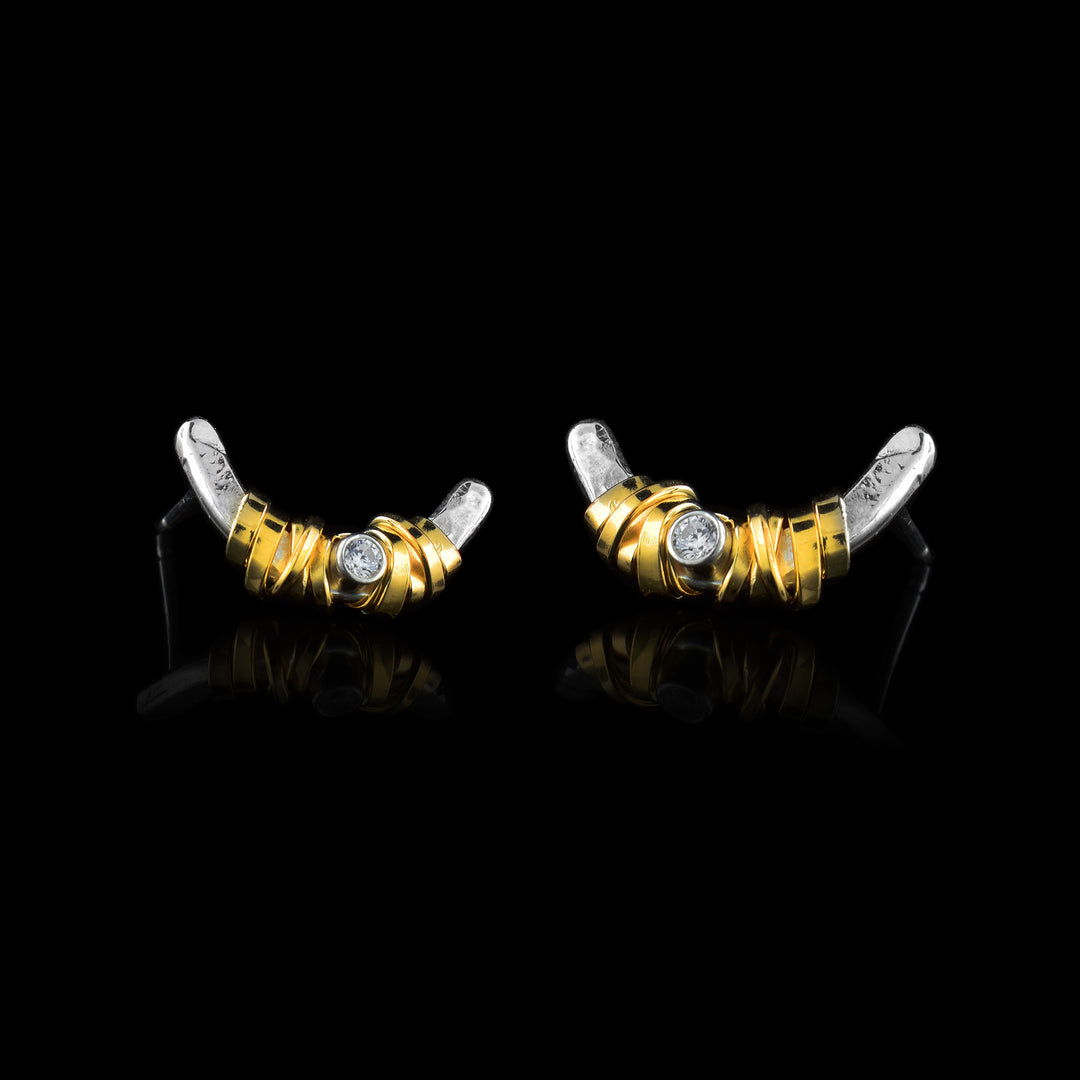 Gold-Fill and Sterling Silver Crescent Earrings with a sparkling gem in the middle.