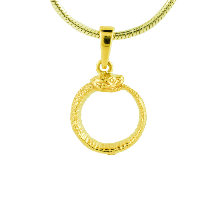 Gold  Auroboros Snake Pendant, the snak is wrapped in a circle its teeth touching its tail forming a perfect circle.