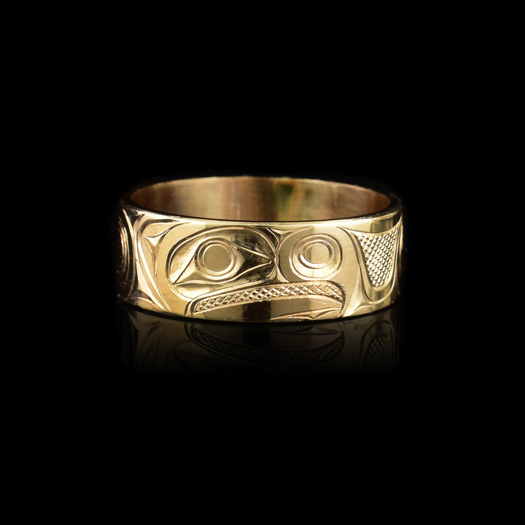 This eagle ring has the profile of an eagle's head facing the right carved in the center of the ring.