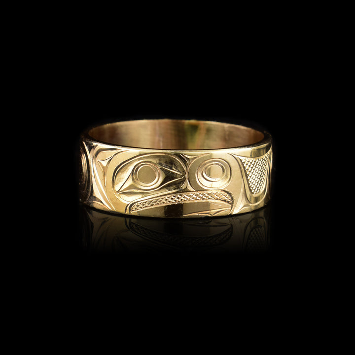 This eagle ring has the profile of an eagle's head facing the right carved in the center of the ring.