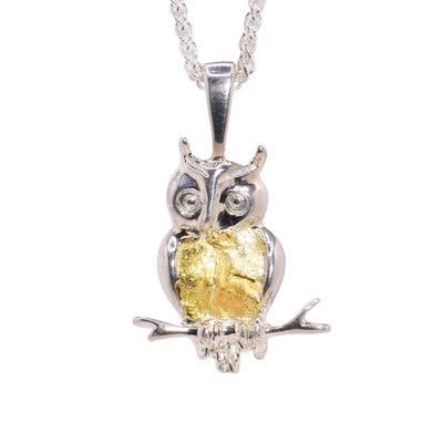 Sterling silver horned owl perched on branch with 22K gold nuggets on belly.