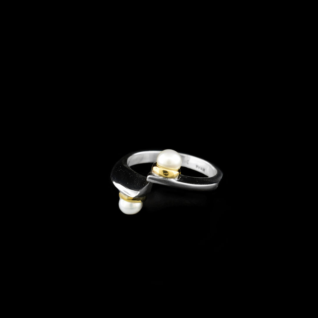 14K gold and sterling silver pearl mirror ring. Features two white freshwater pearls. By Ivan Dobren.